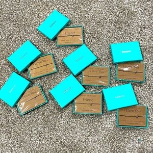 Lot of 7 Morse code bracelets. New in box